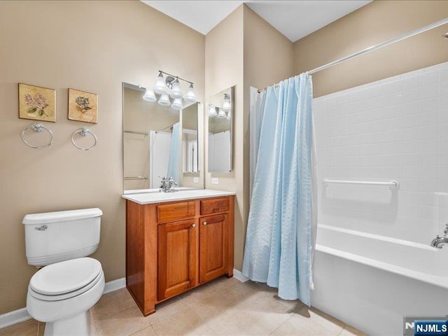 full bathroom featuring tile patterned flooring, vanity, shower / tub combo, and toilet