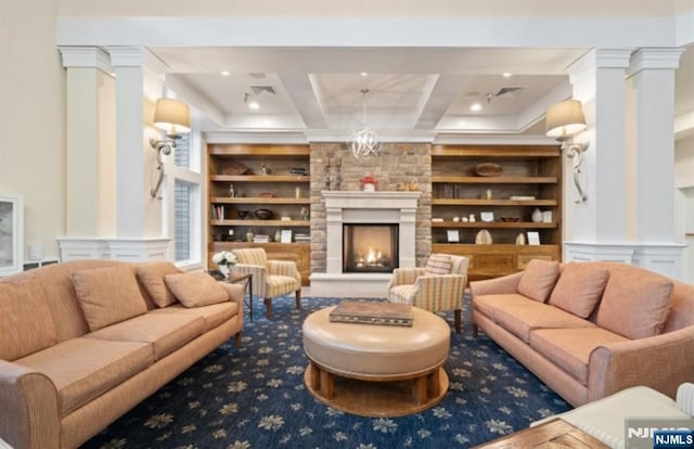 living room featuring a fireplace, coffered ceiling, beam ceiling, and built in features