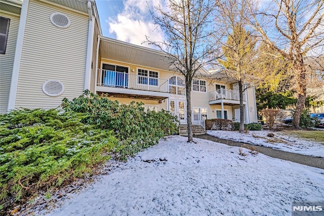 view of snow covered property