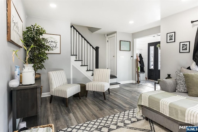 living room with dark wood-type flooring