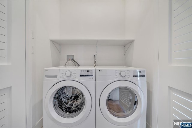 laundry area featuring separate washer and dryer