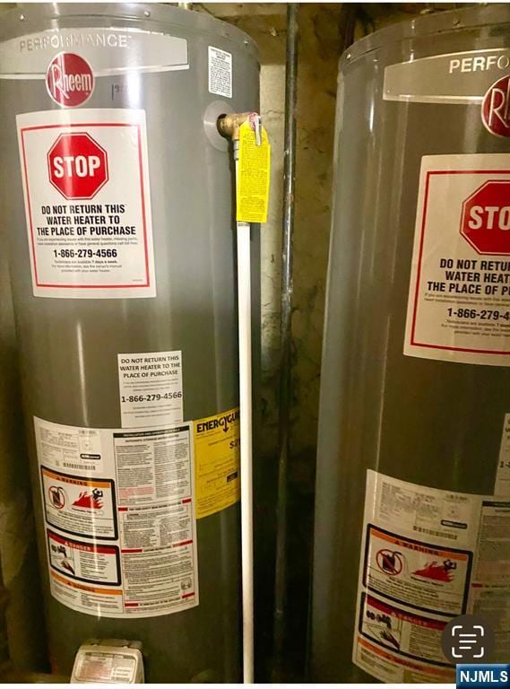 utility room featuring gas water heater