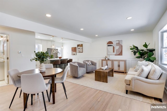 dining room featuring light hardwood / wood-style floors