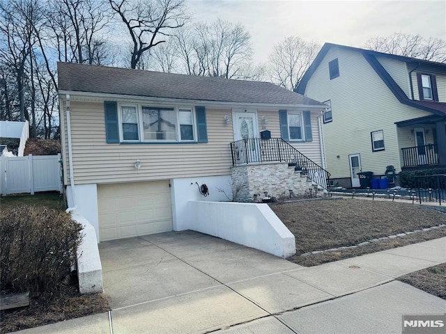 view of front of home featuring a garage