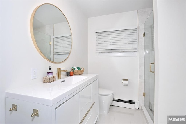 bathroom featuring tile patterned flooring, vanity, walk in shower, baseboard heating, and toilet