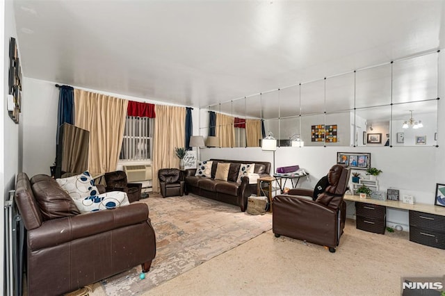 living room with cooling unit, built in desk, and a chandelier