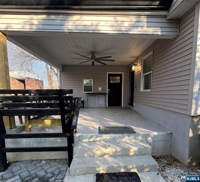 view of patio / terrace featuring ceiling fan