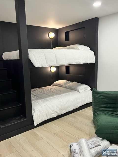 bedroom featuring hardwood / wood-style flooring