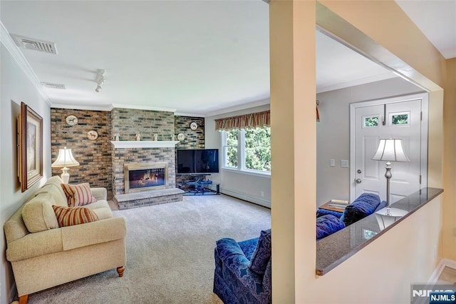 carpeted living room featuring a baseboard heating unit, a brick fireplace, ornamental molding, and visible vents