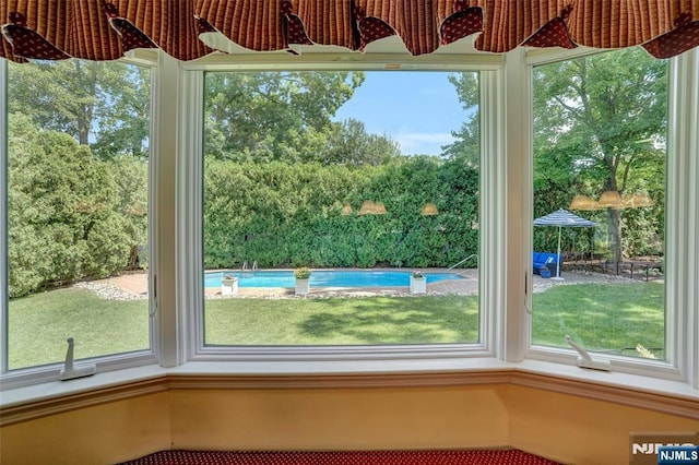 unfurnished sunroom featuring a healthy amount of sunlight