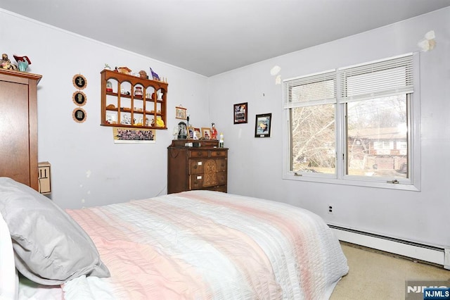 bedroom featuring a baseboard radiator