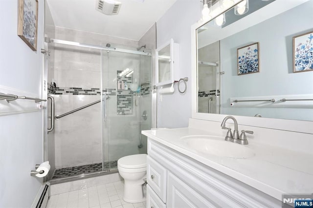 bathroom with toilet, an enclosed shower, vanity, tile patterned flooring, and a baseboard heating unit