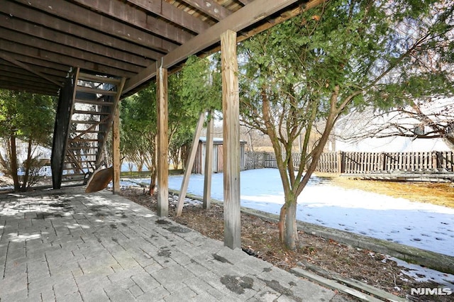 view of snow covered patio