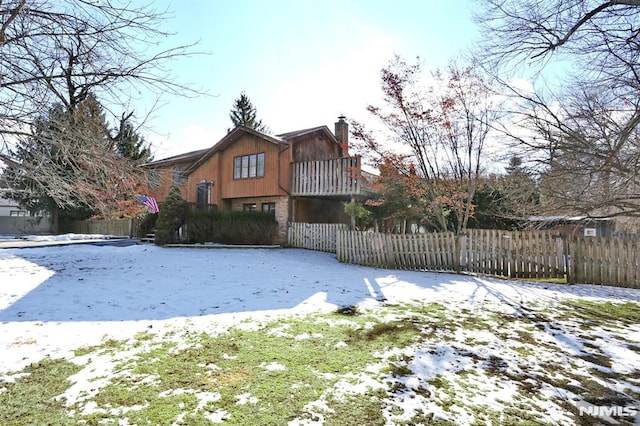 view of yard covered in snow