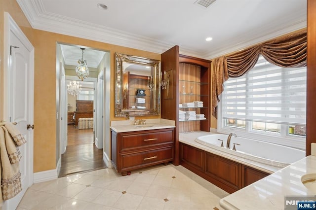 bathroom featuring radiator, tile patterned flooring, vanity, ornamental molding, and an inviting chandelier