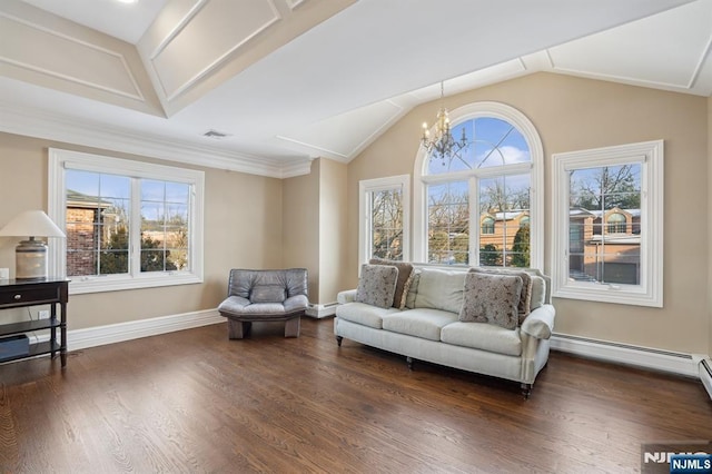 interior space featuring lofted ceiling, a baseboard heating unit, dark hardwood / wood-style flooring, and a notable chandelier