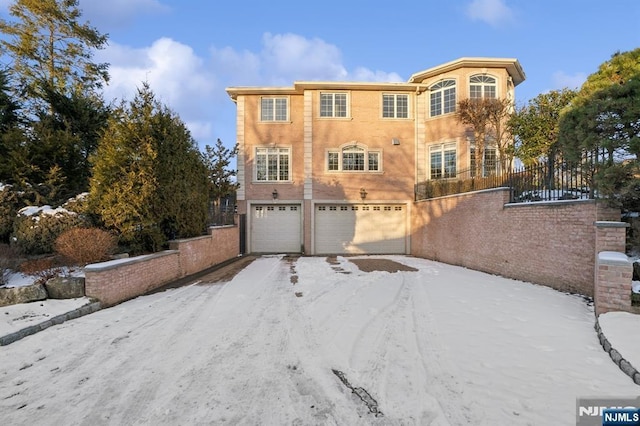 view of front of home with a garage