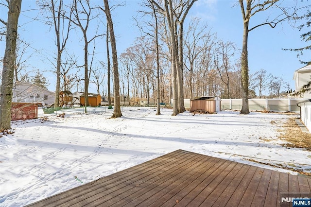 view of snow covered deck