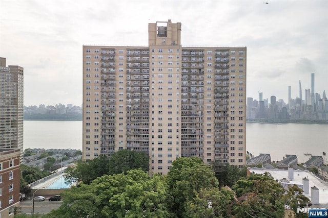 view of property with a water view