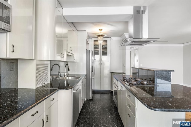 kitchen featuring sink, white cabinetry, island range hood, ornamental molding, and stainless steel appliances