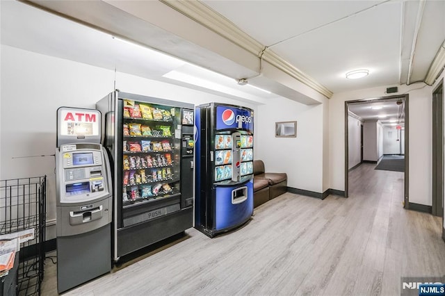 game room with wood-type flooring