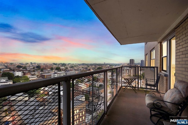 view of balcony at dusk