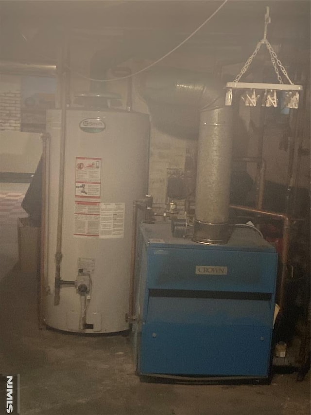 utility room with gas water heater