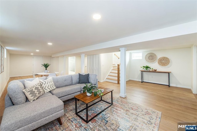 living room with light hardwood / wood-style flooring