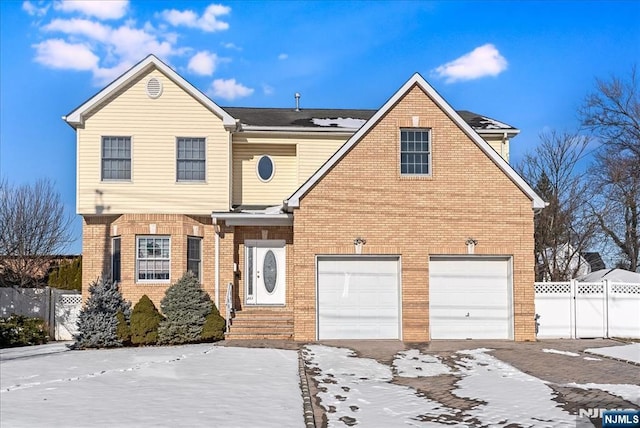 front of property with a garage