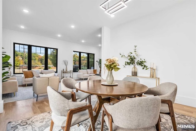 dining room with light wood-type flooring