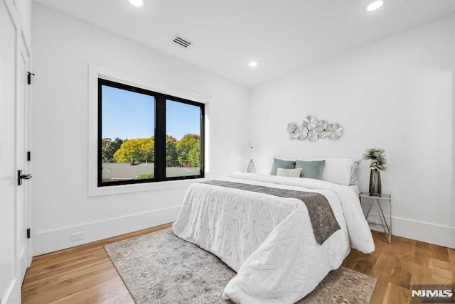 bedroom featuring light wood-type flooring