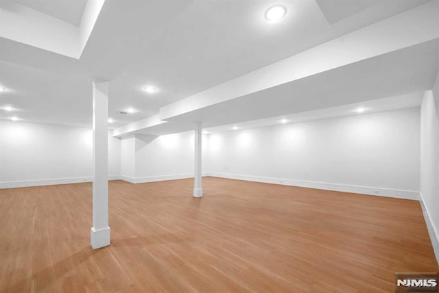 basement with light wood-type flooring