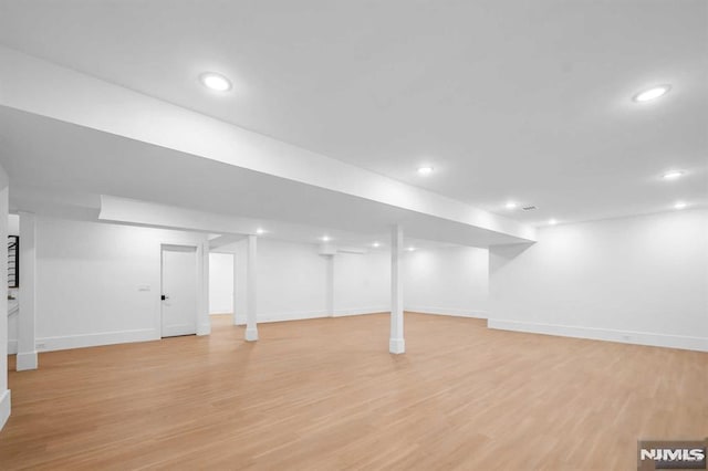 basement with light wood-type flooring