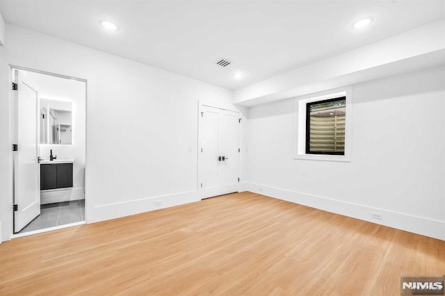 unfurnished room featuring wood-type flooring