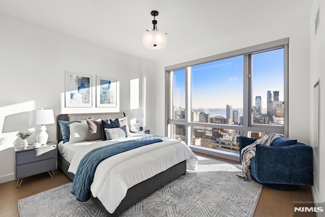 bedroom featuring hardwood / wood-style floors