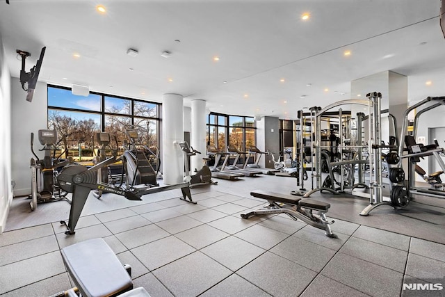 gym featuring a wall of windows