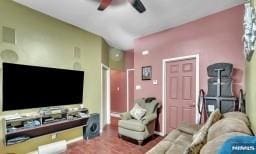 living room featuring ceiling fan