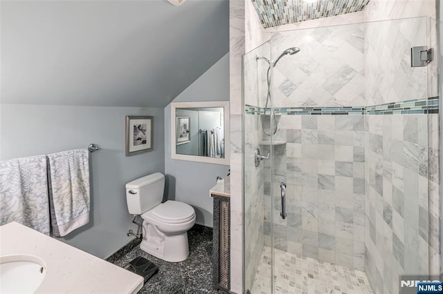 bathroom with an enclosed shower, vanity, lofted ceiling, and toilet