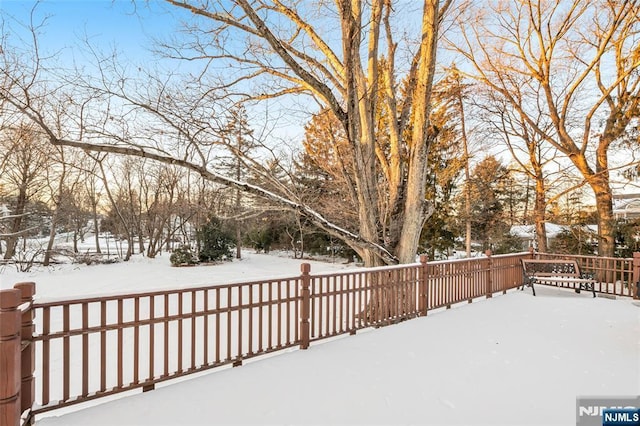 view of snow covered deck