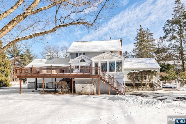 view of front of house featuring a wooden deck