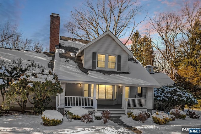 view of front of home featuring covered porch