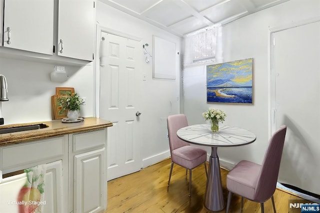 dining area with light wood-type flooring