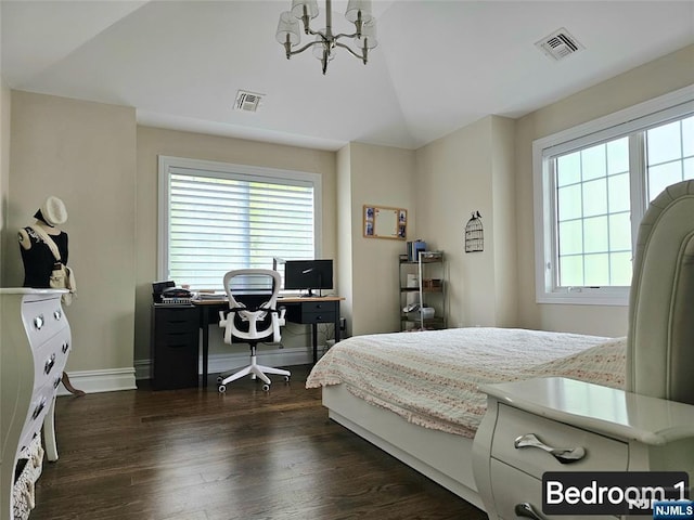 bedroom featuring vaulted ceiling, dark wood finished floors, visible vents, and an inviting chandelier