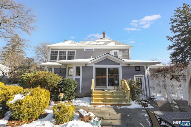 view of snow covered property