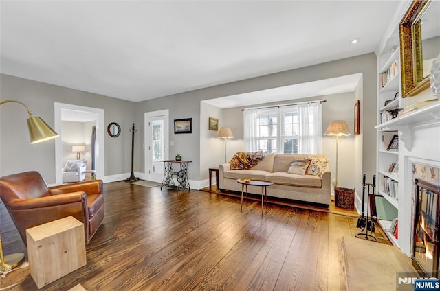 living room with dark wood-type flooring