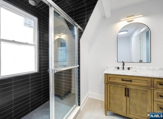 23 Roma St, Nutley, NJ 07110 - full bath with tile patterned flooring, vanity, and a tile shower
