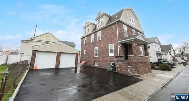 23 Roma St, Nutley, NJ 07110 - view of home's exterior with an outbuilding, fence, brick siding, and central AC