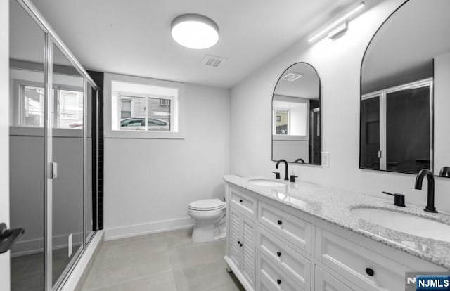 23 Roma St, Nutley, NJ 07110 - bathroom with toilet, a stall shower, double vanity, and a sink