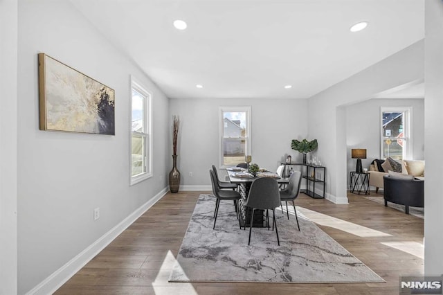 dining area with light hardwood / wood-style flooring