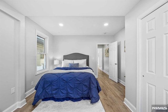 bedroom featuring hardwood / wood-style flooring